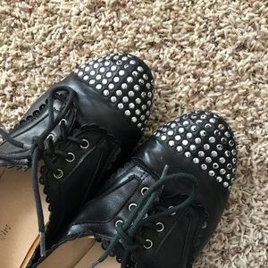 Studded black oxfords